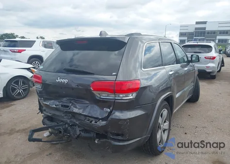 2014 Jeep Grand Cherokee Overland z USA, uszkodzony, nr VIN 1C4RJFCG6EC211600